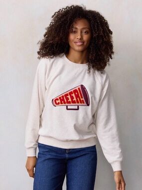 NWOT LC Lauren Conrad Cream Sweatshirt with Red & Yellow Cheer Megaphone